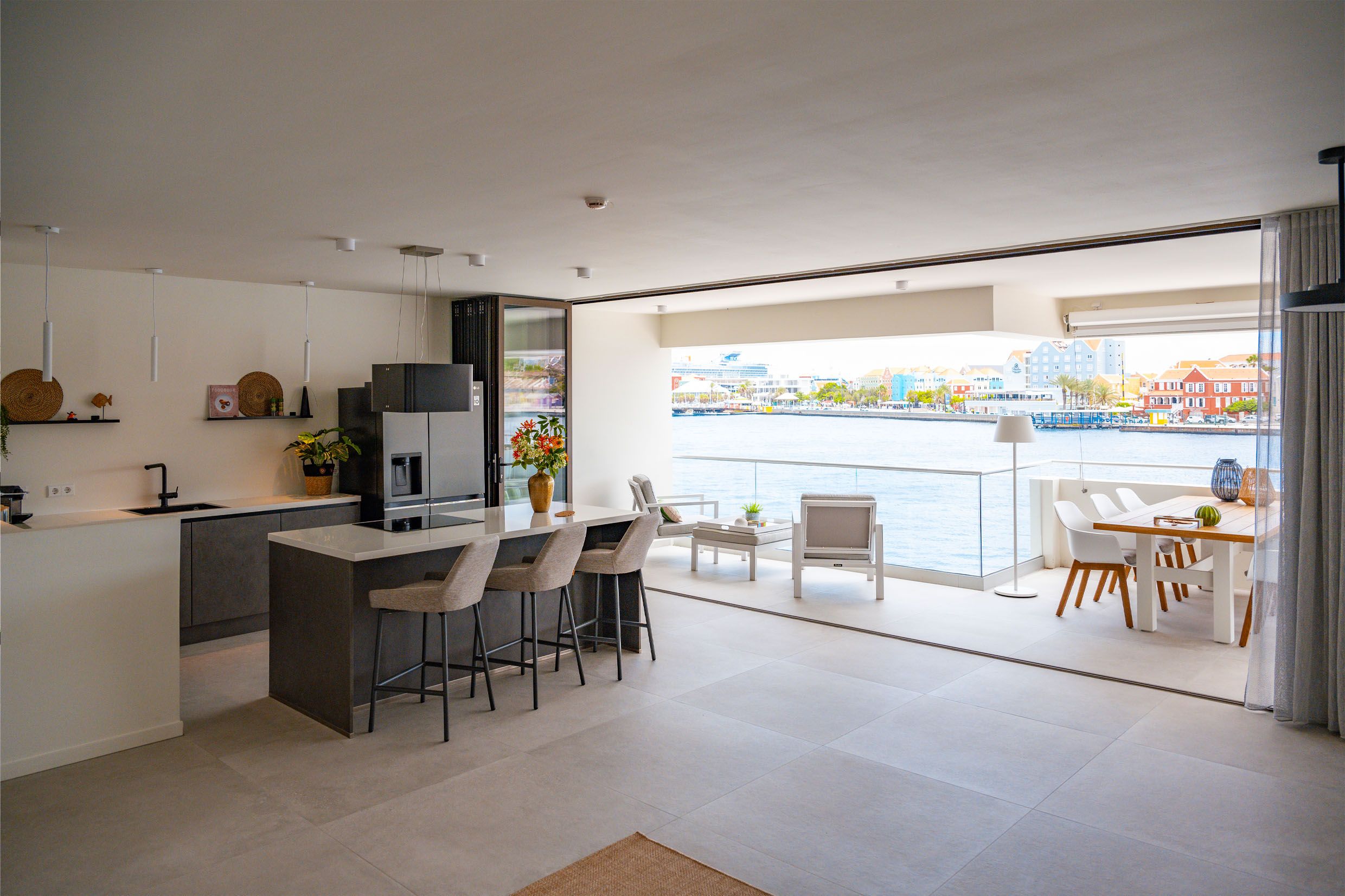 Open plan kitchen/livingroom, extra wide sliding doors to the terrace